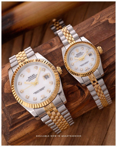 ست ساعت زنانه و مردانه رولکس Rolex Datejust اصلی (بالاترین گرید موجود در بازار با ضمانت اصالت) ساعت ست موتور ژاپن A+++ دارای روزشمار صفحه صدفی مارک حک شده رولکس داخل دیواره صفحه مارک حک شده رولکس بر روی پیچ تنظیم قاب و بند فول استیل شیشه (تلسکوپی) کریستال ضدخش اصلی ضدآب 3Atm